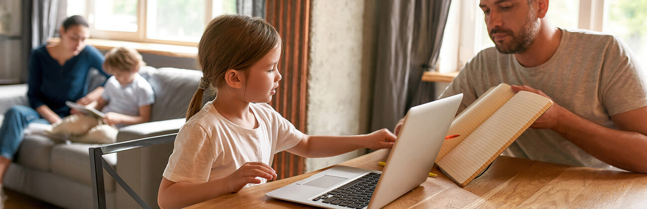 Connected family on laptop and tablet